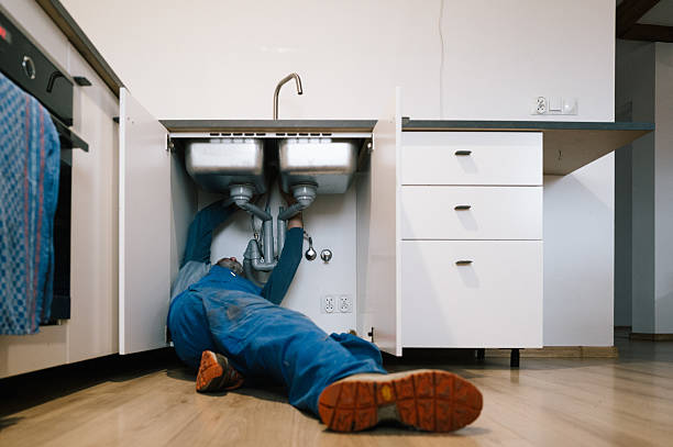 Professional Emergency Plumber technician working in Chase, PA